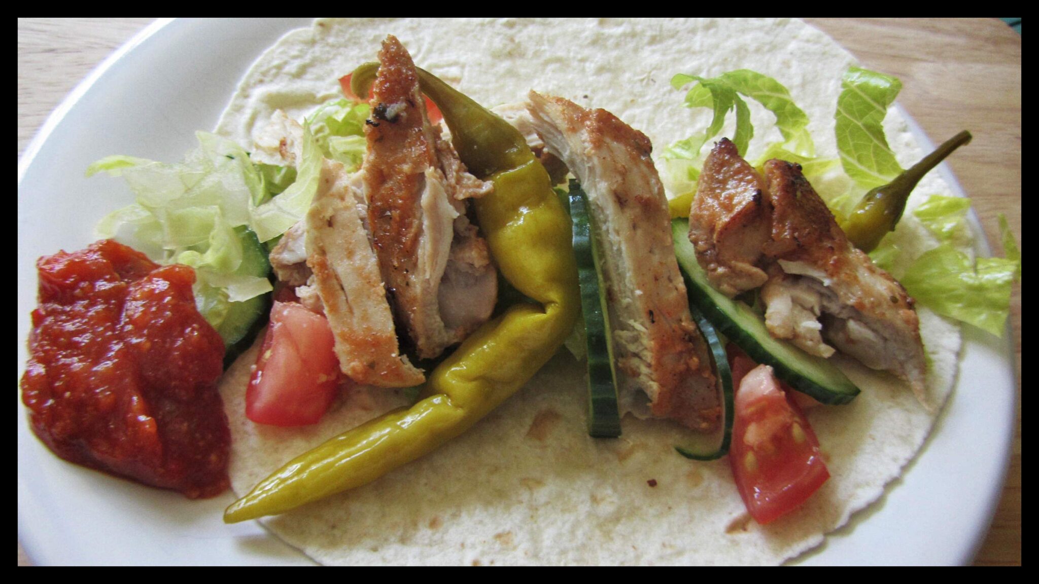 Chicken kebab with lots of fresh salt, pickled chillies and a home made chilli sauce