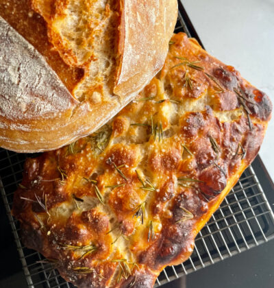 Italian bread making class learning how to make the perfect focaccias, pizza dough and grissini flavoured with herbs and rosemary