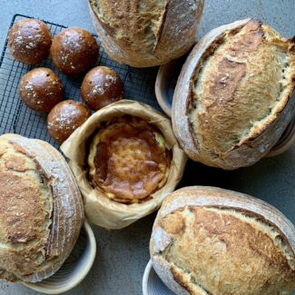 Array of loaves from the bread workshop by Laura Scott, one of the cookery classes in Surrey run for adults and kids